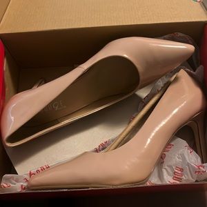 Woman Nude patent size 8 close toe heel.